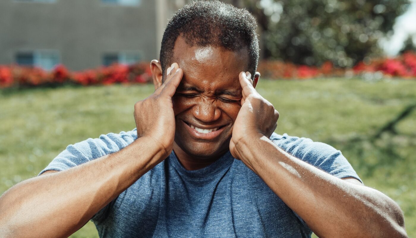 Photo by Kindel Media: https://www.pexels.com/photo/a-stressed-man-massaging-his-temple-7298615/