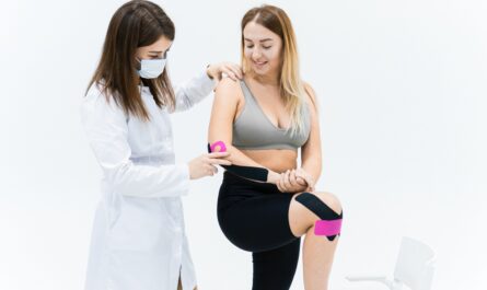 Photo by Maksim Goncharenok: https://www.pexels.com/photo/a-woman-getting-plastered-with-kinesio-tapes-by-another-woman-6094057/