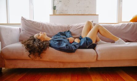 Photo by Polina Zimmerman: https://www.pexels.com/photo/woman-suffering-from-a-stomach-pain-lying-down-on-couch-3958561/