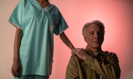 Photo by Ron Lach : https://www.pexels.com/photo/nurse-holding-hand-of-elderly-man-9893524/